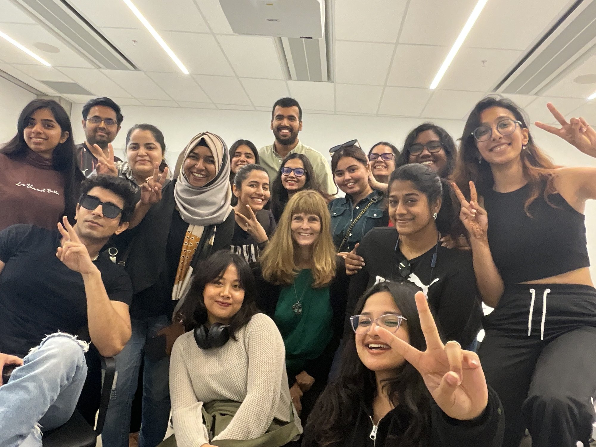 Image of Kartik and his classmates and professor