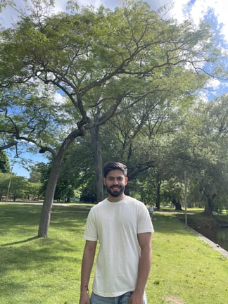 Another image of Ankush Mehta with him Standing Infront of Trees and Greenery